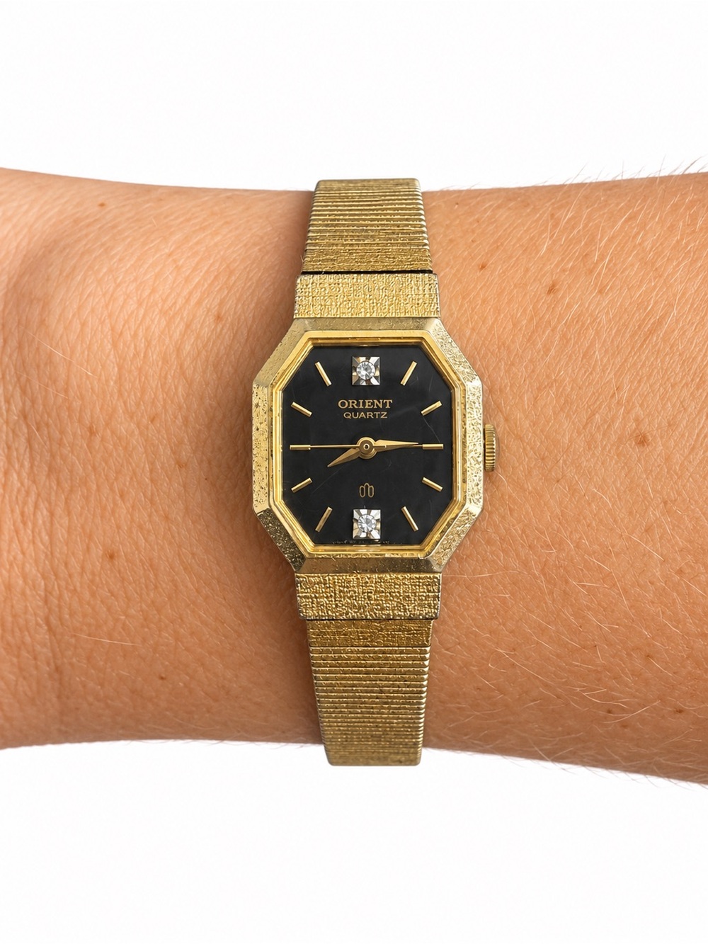 Vintage Delicate Orient Quartz Women's Gold Tone Watch with Black Dial